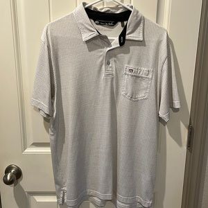 White with gray squared Travis Mathew polo
